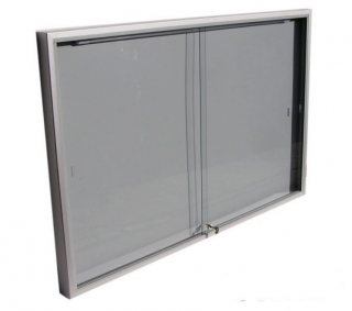 Závesná vitrína s úzkym profilom s posúvnymi sklami Název: Formát 10xA4, rozmer: šírka 1220 x výška 730 x hĺbka 69mm
