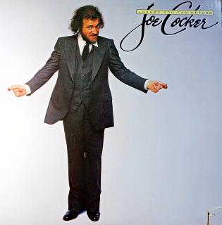 LP Joe Cocker ‎– Luxury You Can Afford (Na desce pouze jemné vlásenky. Obal má odseknutý dolní pravý roh (označení importu).)