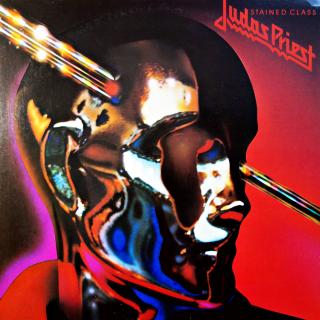 LP Judas Priest ‎– Stained Class (Včetně insertu s japonskými texty (dvě strany). Na desce jediný výraznější škrábanec přes celou skladbu A1, ale zvuk není poškozen, nejdou slyšet žádné lupance. Obal je ve velmi dobrém stavu.)