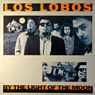 LP Los Lobos ‎– By The Light Of The Moon (Na desce dva výrazné škrábance, ale záznam není poškozen, lupance nejsou slyšet ani v mezerách mezi skladbami. Obal v bezvadném stavu.)