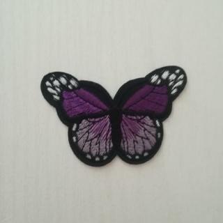 Nažehlovačka - motýľ fialový