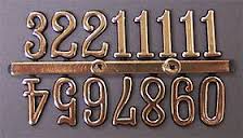 Hodinové čísla čierno-zlaté plastové, 2,5 cm (Hodinové čísla čierno-zlaté plastové, 2,5 cm)